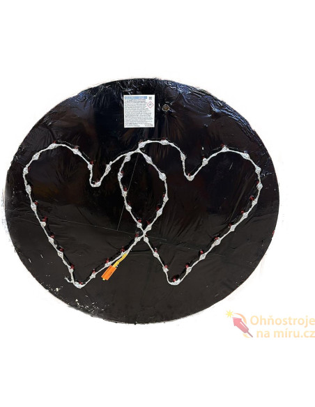 Pyrotechnika velké dvojité svatební srdce ve zlatém slunci